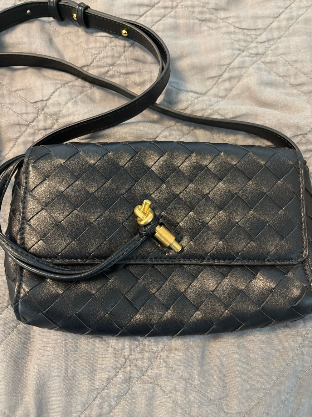 Black woven crossbody bag
